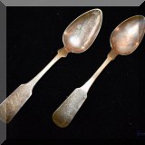 K06. 2 Monogrammed sterling spoons. 